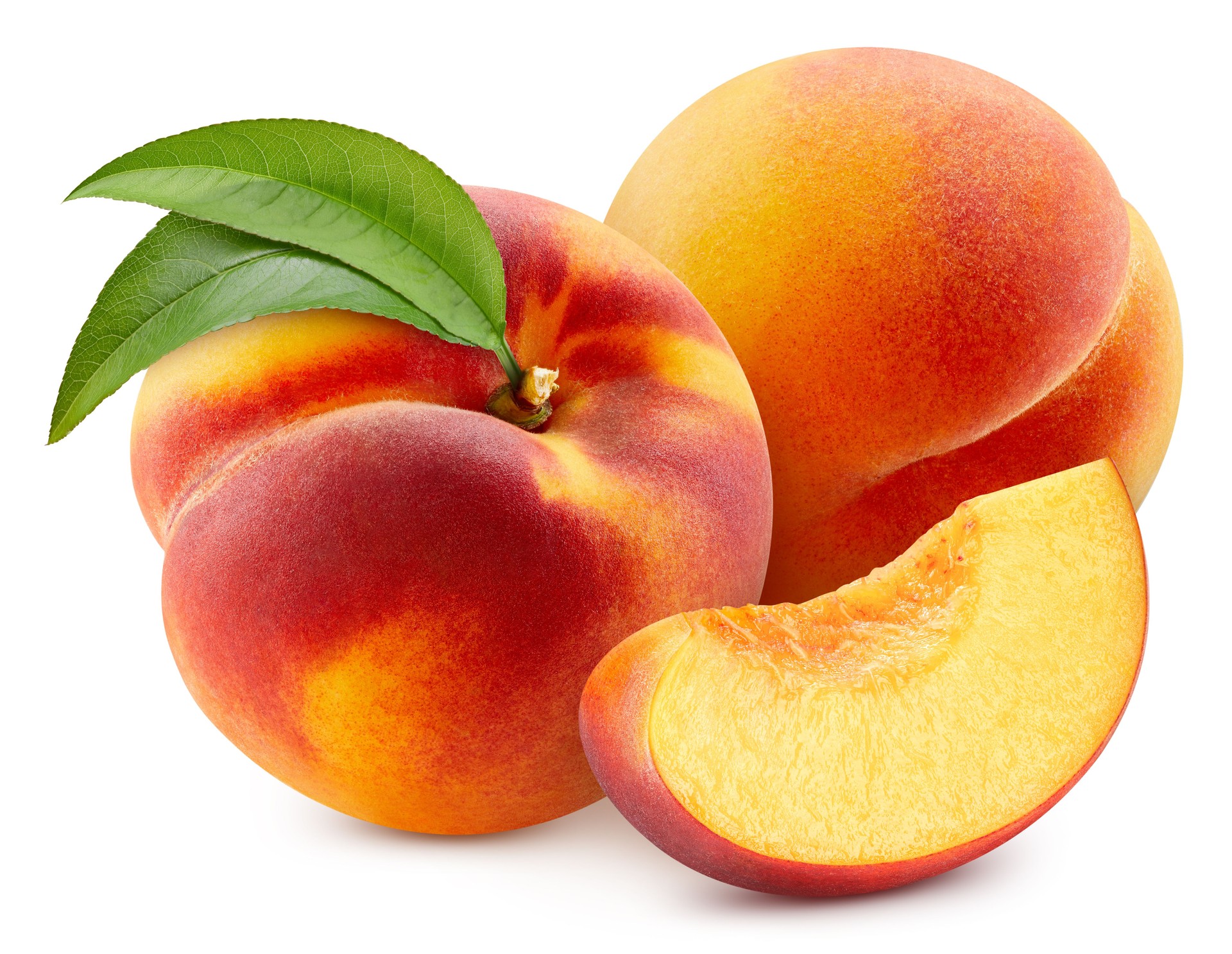 Peach with leaf isolated on white background